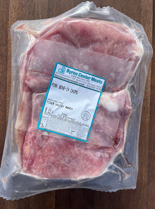 Bone-In Pork Chop - four pack $8.99/lb